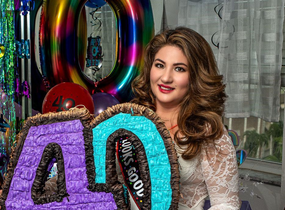 Karla Campos, a radiant mompreneur, celebrating her 40th birthday with joy and confidence